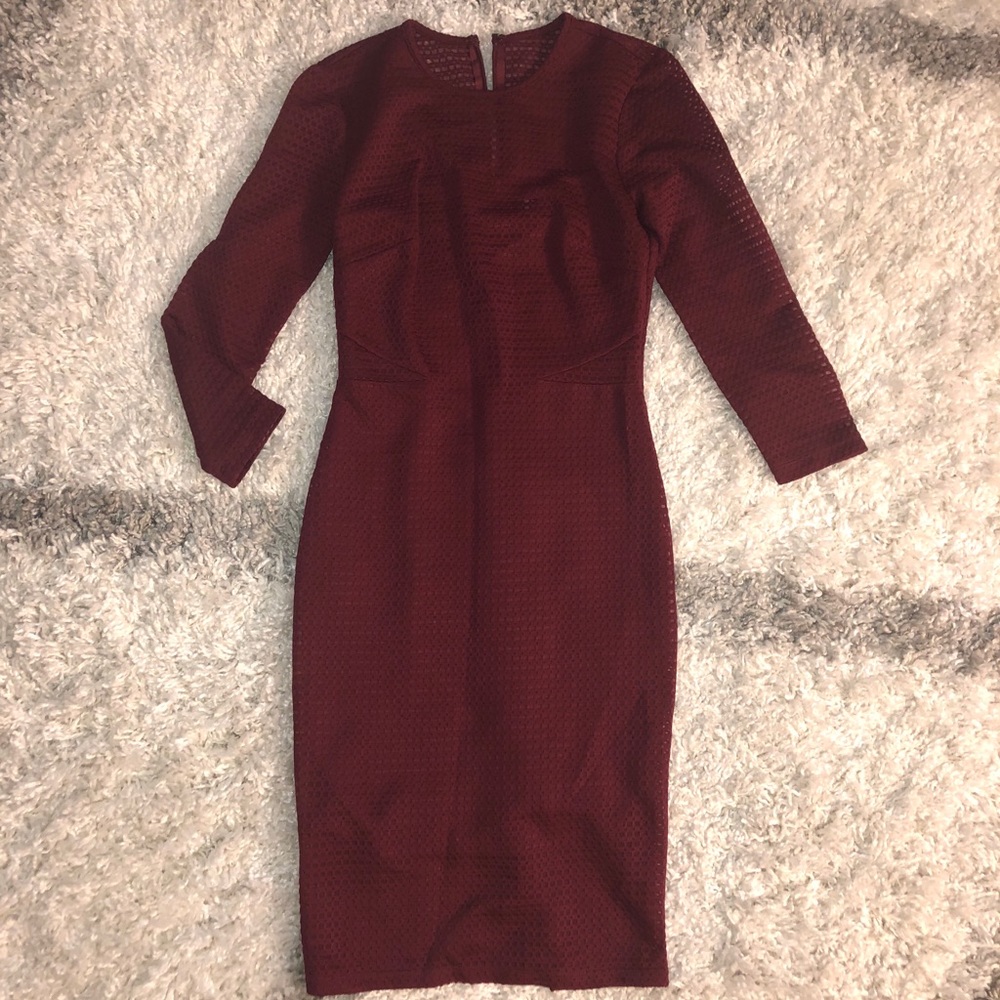Gorgeous form-fitting read dress.